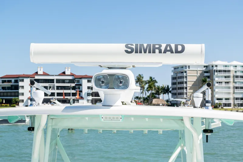 Slide: The Image of 2015 SeaVee 390Z boat with Simrad radar, coastal buildings in background. - 27