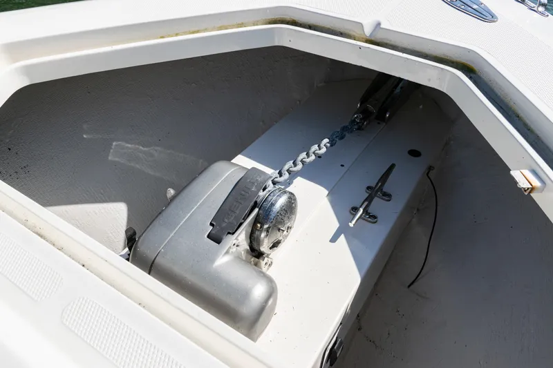 Slide: The Image of Anchor compartment of 2015 SeaVee 390Z boat with chain and winch. - 42