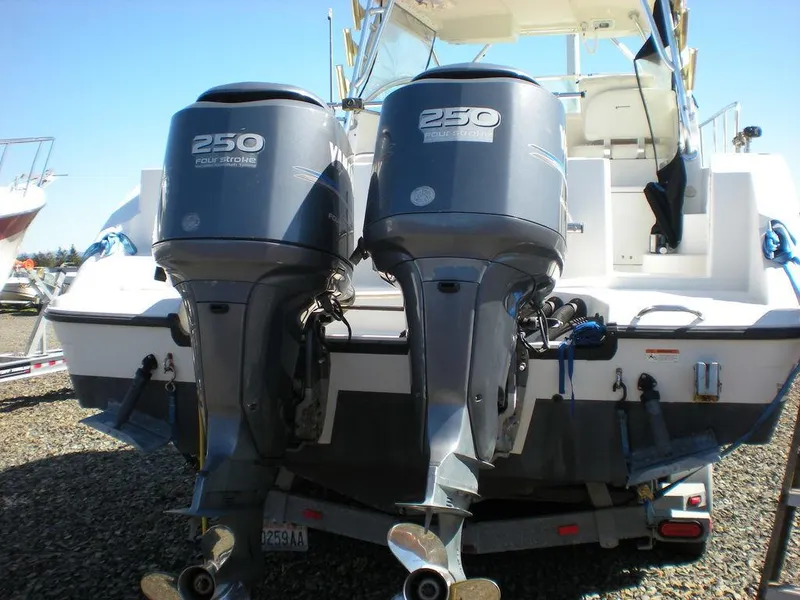 Slide: The Image of 2006 Seaswirl Striper boat with twin 250 horsepower outboard engines. - 2