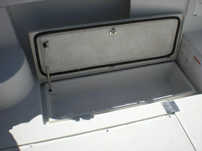 Slide: The Image of Open storage compartment on a 2006 Seaswirl Striper boat. - 31