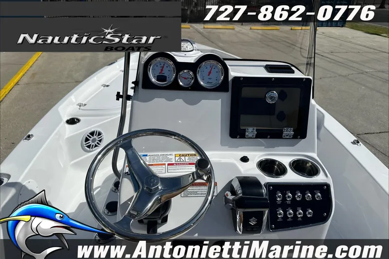 Slide: The Image of 2025 NauticStar 194 Bay boat dashboard with controls and gauges, Antonietti Marine branding. - 17