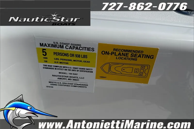 Slide: The Image of NauticStar 194 Bay 2025 boat capacity label, seating guide, and contact information. - 7