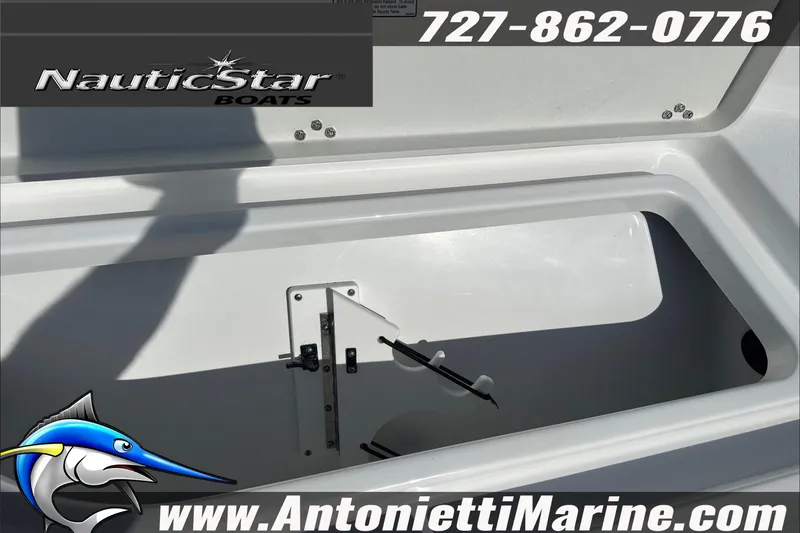 Slide: The Image of 2025 NauticStar 194 Bay boat interior with storage compartment, contact Antonietti Marine. - 8