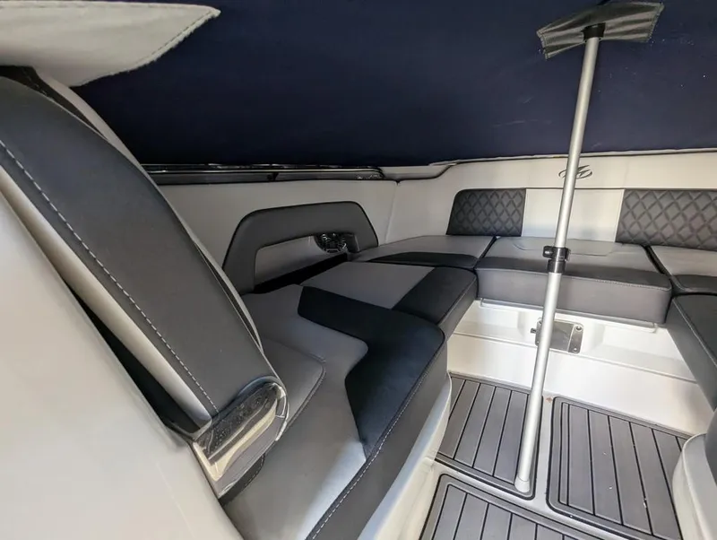 Slide: The Image of Interior of 2023 Monterey M-65 boat with sleek seating and modern design. - 21