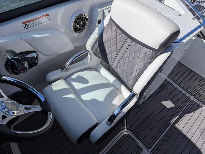 Slide: The Image of Captain's seat in 2023 Monterey M-65 boat, featuring sleek design and premium materials. - 33