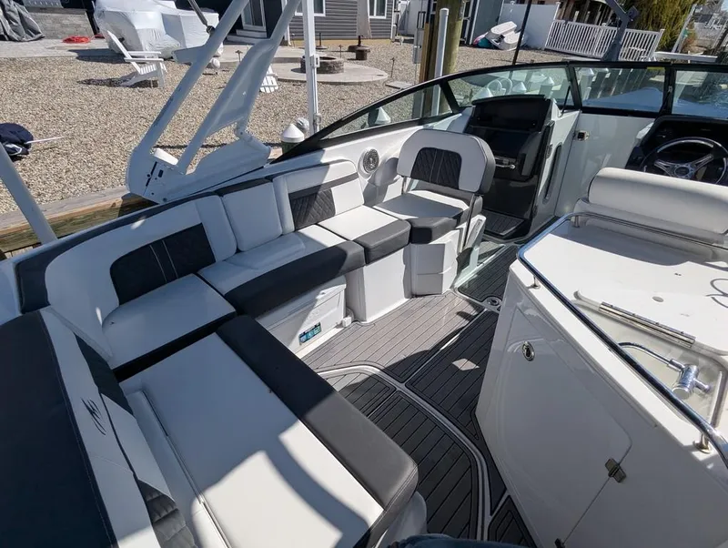 Slide: The Image of 2023 Monterey M-65 boat interior with sleek seating and modern design. - 49