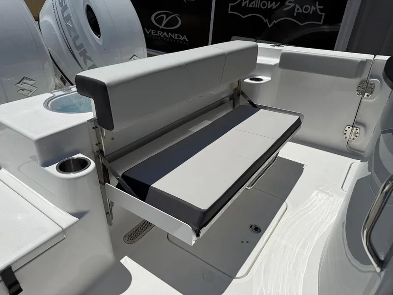 Slide: The Image of 2025 Sea Pro 262 Offshore boat with foldable seating and cup holders. - 14
