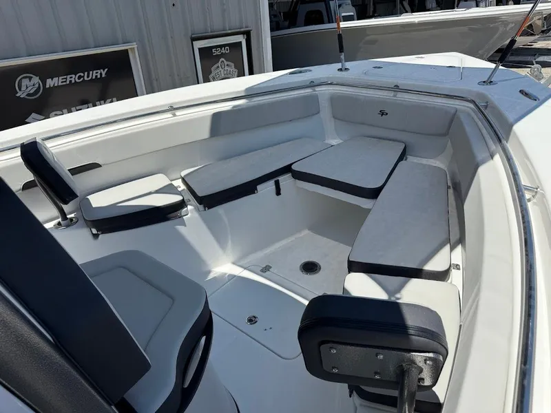 Slide: The Image of 2025 Sea Pro 262 Offshore boat interior with cushioned seating and modern design. - 23