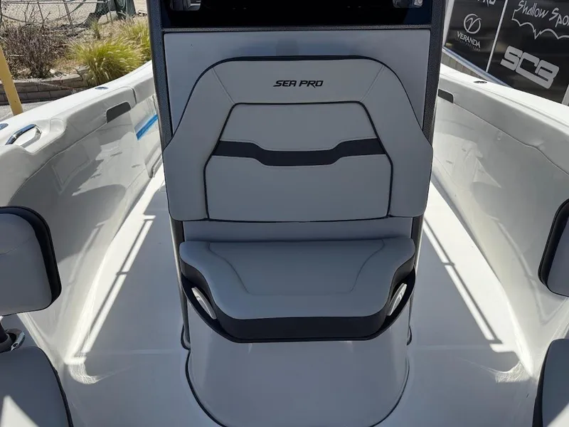 Slide: The Image of 2025 Sea Pro 262 Offshore boat interior with sleek seating design. - 27