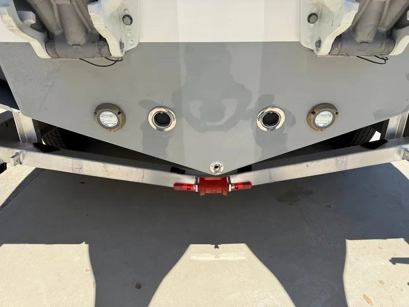 Slide: The Image of Rear view of 2025 Sea Pro 262 Offshore boat on trailer, showing hull and fittings. - 8