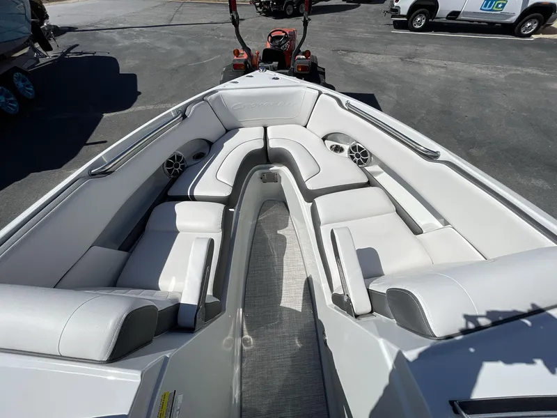 Slide: The Image of 2023 Crownline 240 SS boat interior with spacious seating and modern design. - 12