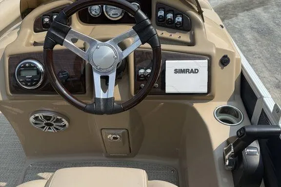 Slide: The Image of Steering console of 2018 Bennington 23GSRFB boat with Simrad navigation system. - 8