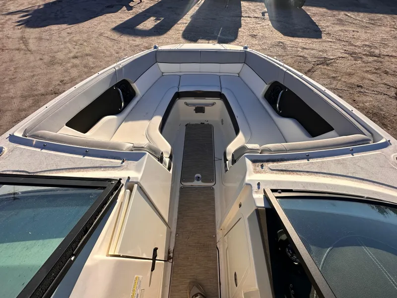 Slide: The Image of 2016 Sea Ray 240 Sundeck boat interior with spacious seating and sleek design. - 5