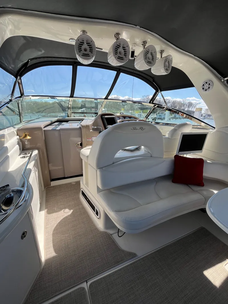 Slide: The Image of Interior of 2003 Sea Ray 380 Sundancer yacht with plush seating and modern amenities. - 10