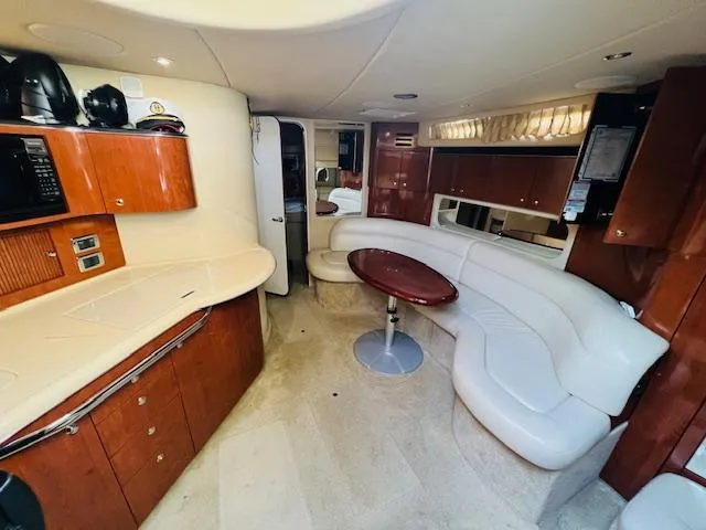 Slide: The Image of Luxurious interior of 2003 Sea Ray 380 Sundancer yacht with modern amenities and elegant design. - 27