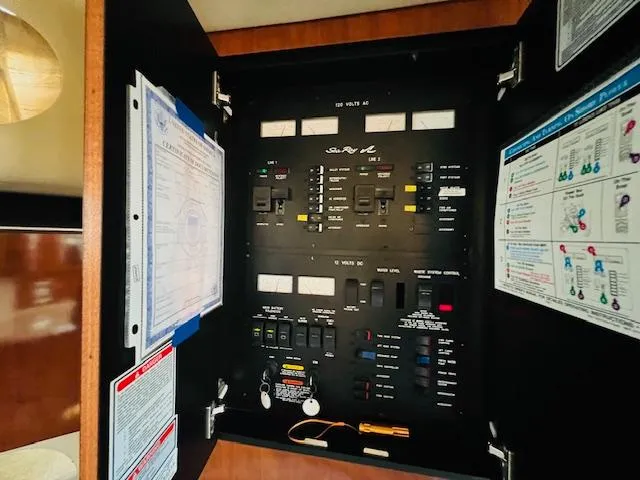 Slide: The Image of Electrical control panel of a 2003 Sea Ray 380 Sundancer boat. - 34