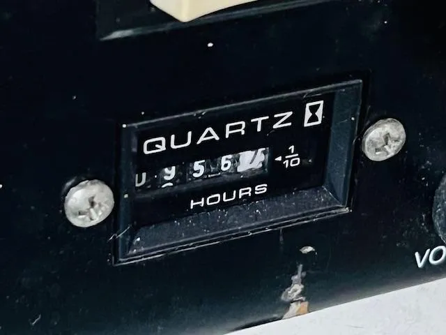 Slide: The Image of Hour meter reading 956.7 on 2003 Sea Ray 380 Sundancer boat. - 35