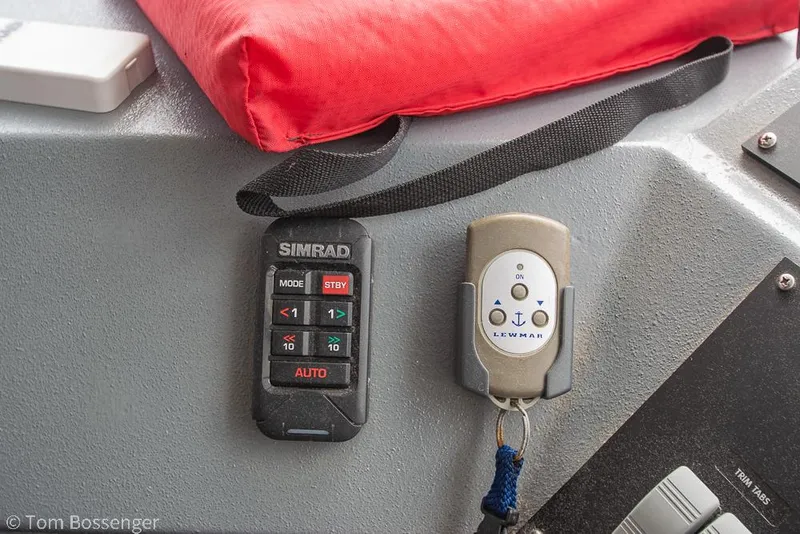 Slide: The Image of Control panel on 1986 Bayliner 4588 Pilothouse with Simrad and Lewmar devices. - 36