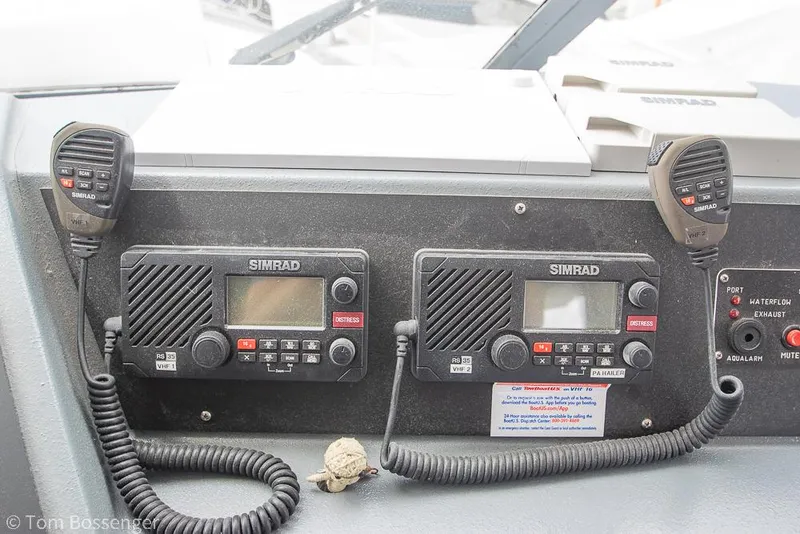 Slide: The Image of Dual Simrad radios on 1986 Bayliner 4588 Pilothouse dashboard. - 37