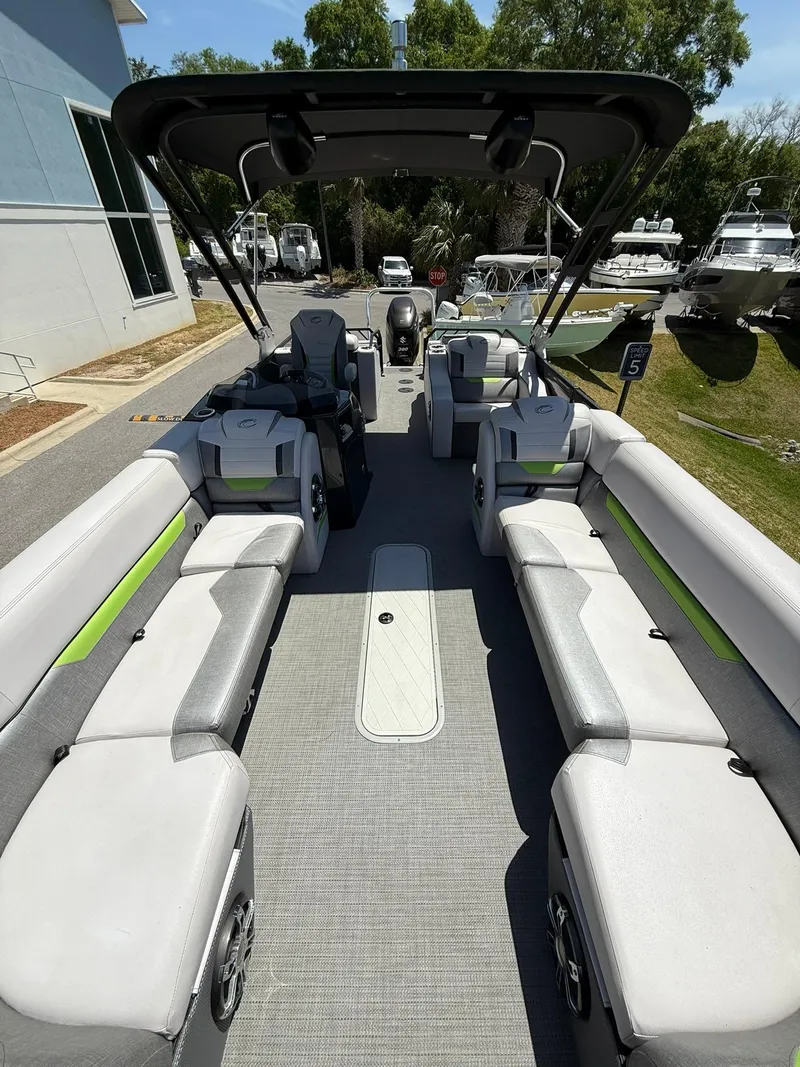 Slide: The Image of 2017 Crest Caliber 230 SLR2 pontoon boat with spacious seating and modern design. - 10