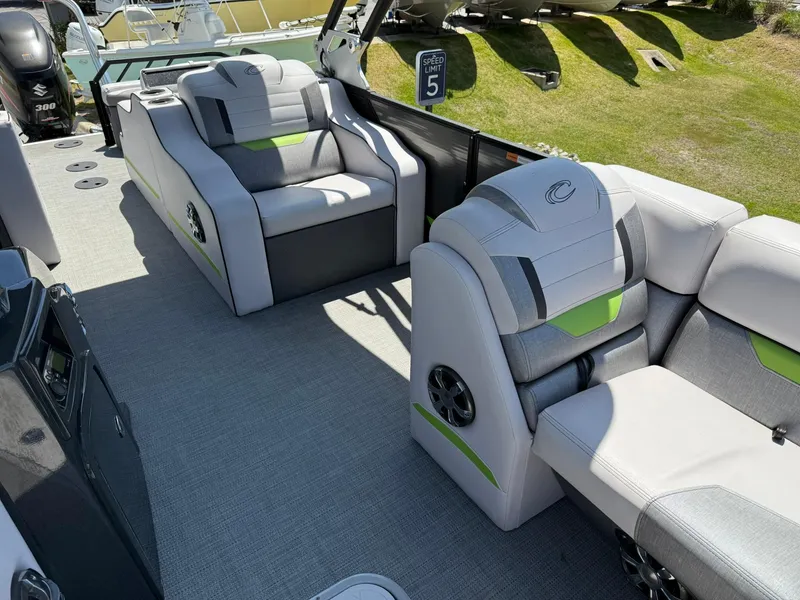 Slide: The Image of 2017 Crest Caliber 230 SLR2 boat interior with plush seating and modern design. - 11