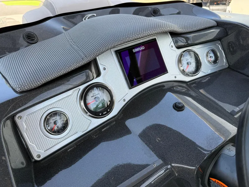 Slide: The Image of Dashboard of 2017 Crest Caliber 230 SLR2 boat with gauges and Simrad display. - 15