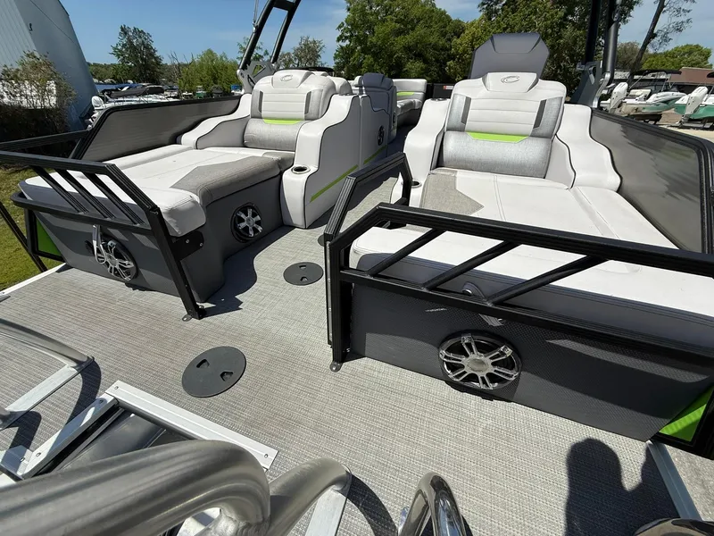 Slide: The Image of 2017 Crest Caliber 230 SLR2 pontoon boat interior with plush seating and modern design. - 20