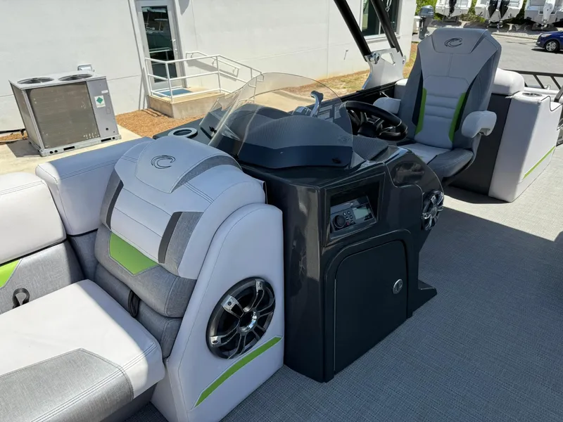 Slide: The Image of 2017 Crest Caliber 230 SLR2 boat interior with modern seating and control console. - 9