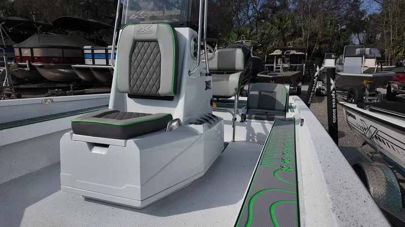 Slide: The Image of 2025 Xpress H24B boat interior with modern seating and sleek design. - 29
