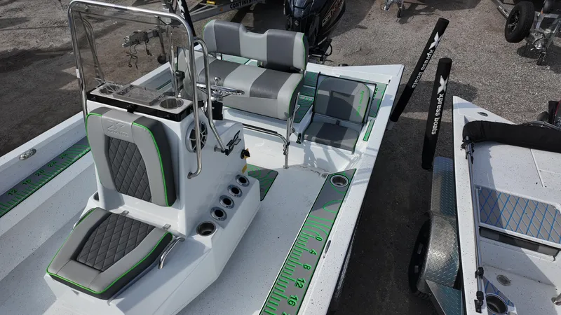 Slide: The Image of 2025 Xpress H24B boat with sleek seating and modern design features. - 30