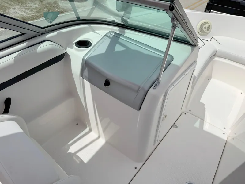 Slide: The Image of 2015 Yamaha Boats SX190 interior with seating and windshield. - 19