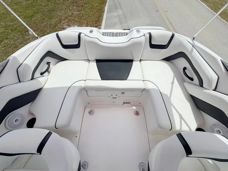Slide: The Image of 2015 Yamaha Boats SX190 interior with white seating and black accents. - 22