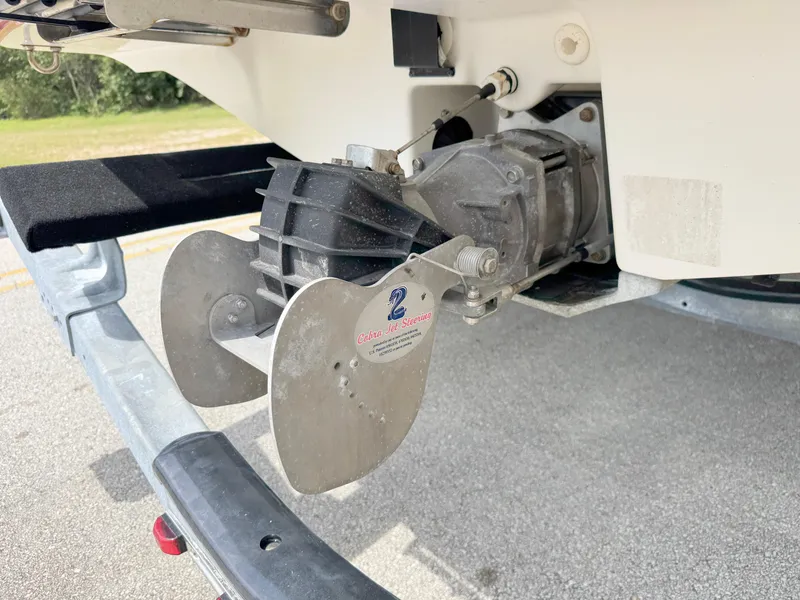 Slide: The Image of 2015 Yamaha Boats SX190 jet drive system on trailer, showcasing propulsion components. - 34