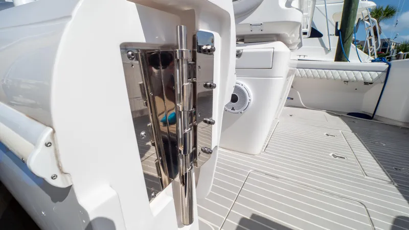 Slide: The Image of 2022 Intrepid 345 Valor boat deck with stainless steel hardware and seating area. - 39