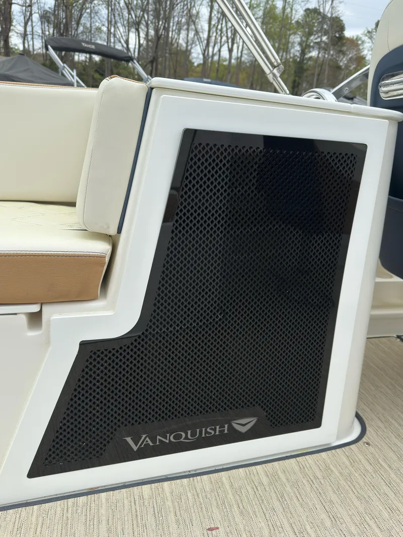 Slide: The Image of 2016 Vanquish 26 DC boat interior with speaker detail. - 23