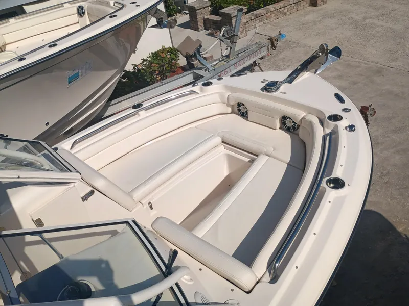 Slide: The Image of 2024 Grady-White Freedom 235 boat with spacious seating and sleek design. - 27