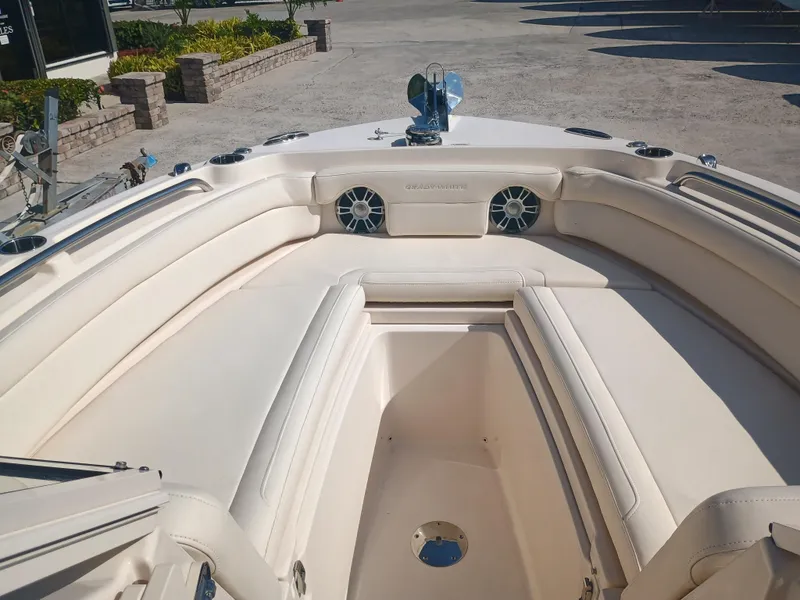 Slide: The Image of 2024 Grady-White Freedom 235 boat interior with spacious seating and modern design. - 5
