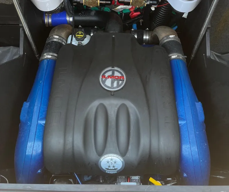 Slide: The Image of 2025 MasterCraft X24 engine with blue accents and branded cover. - 7