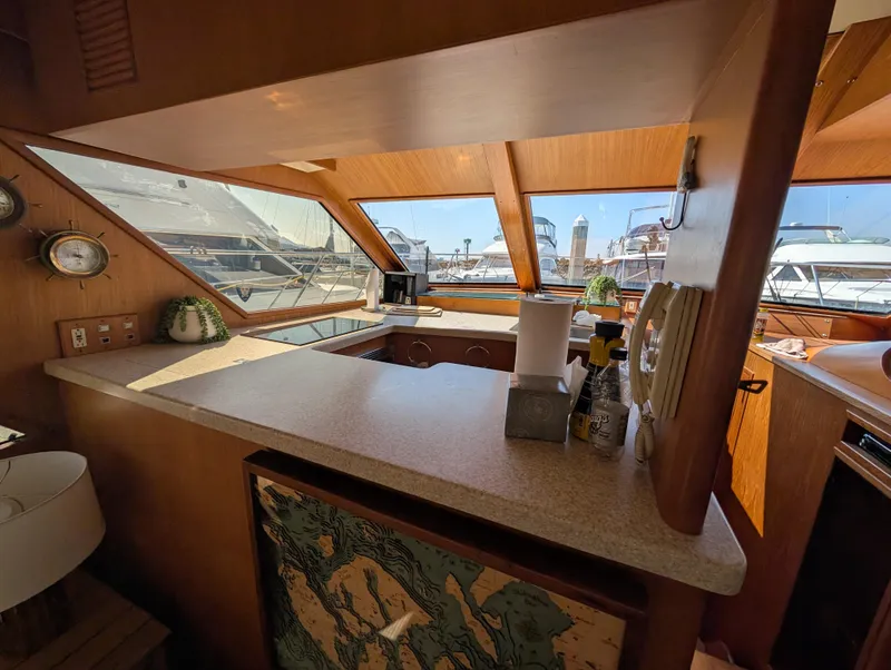 Slide: The Image of Interior of 1986 Ocean Alexander 39 Sedan yacht with spacious kitchen and large windows. - 20