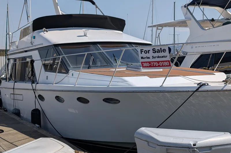 Slide: The Image of 1986 Ocean Alexander 39 Sedan yacht for sale at marina dock. - 3