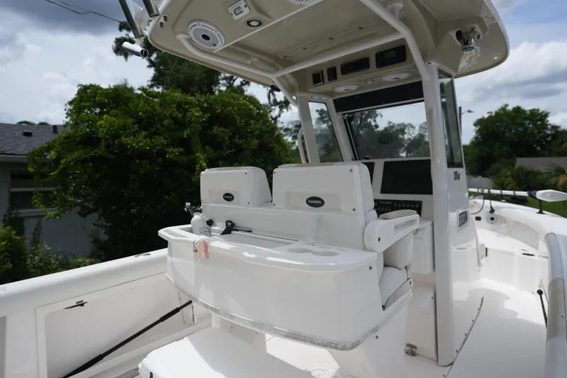 Slide: The Image of 2017 Everglades 255 boat interior with seating and control panel. - 10