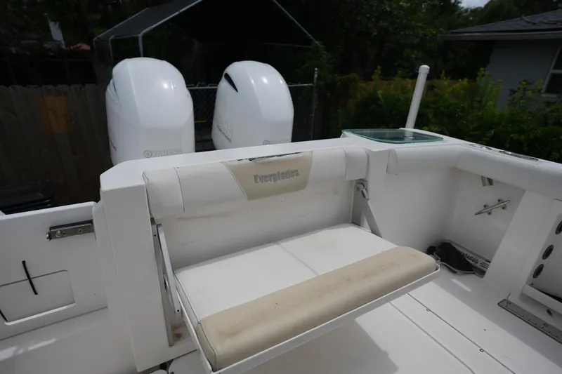 Slide: The Image of 2017 Everglades 255 boat with dual Yamaha engines and foldable seating. - 11