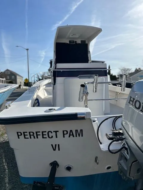 Slide: The Image of 2015 Maritime Skiff 23 Patriot boat named "Perfect Pam VI" with Honda outboard motor. - 6