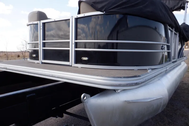 Slide: The Image of 2021 Sylvan Mirage 820 LZ pontoon boat with sleek black exterior and aluminum rails. - 12
