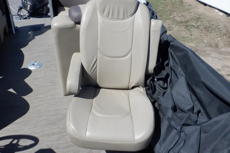 Slide: The Image of Beige seat on 2021 Sylvan Mirage 820 LZ boat, outdoor setting. - 17