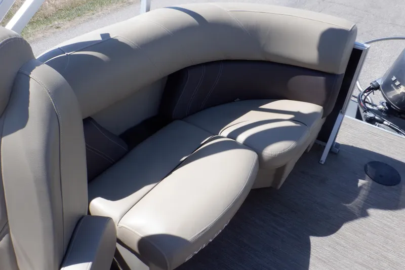 Slide: The Image of 2021 Sylvan Mirage 820 LZ boat with beige seating and carpeted floor. - 19