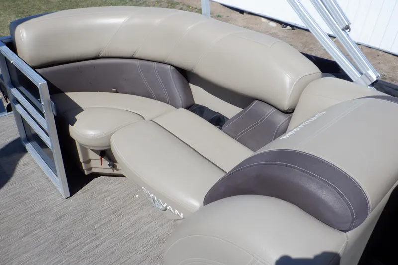 Slide: The Image of 2021 Sylvan Mirage 820 LZ boat seating with beige and brown upholstery. - 20