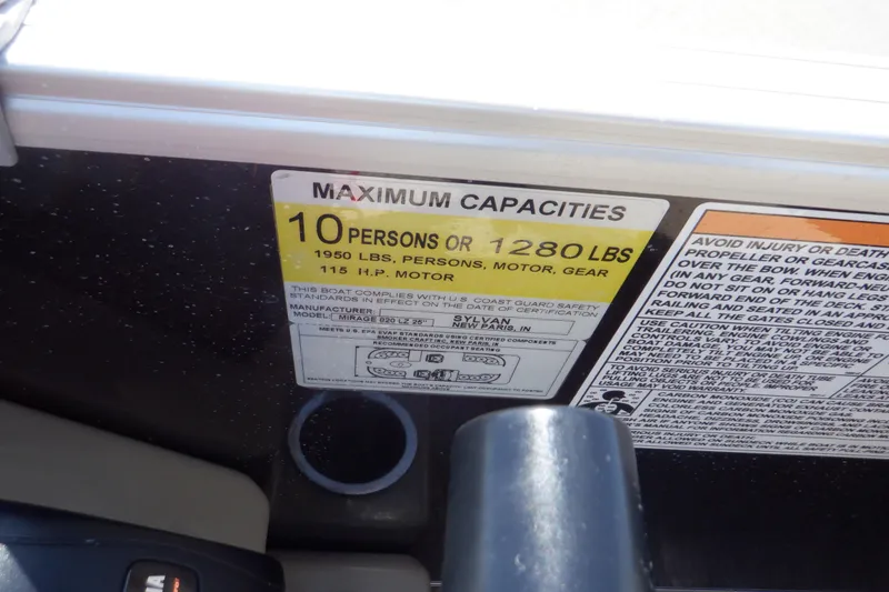 Slide: The Image of Capacity label on 2021 Sylvan Mirage 820 LZ, showing limits for persons and weight. - 22