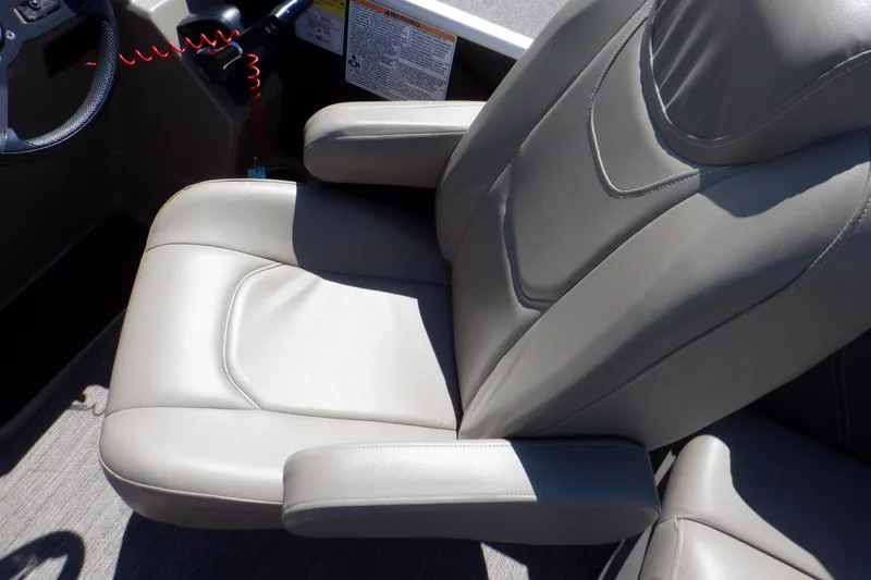 Slide: The Image of Captain's chair on 2021 Sylvan Mirage 820 LZ pontoon boat, featuring comfortable gray upholstery. - 25