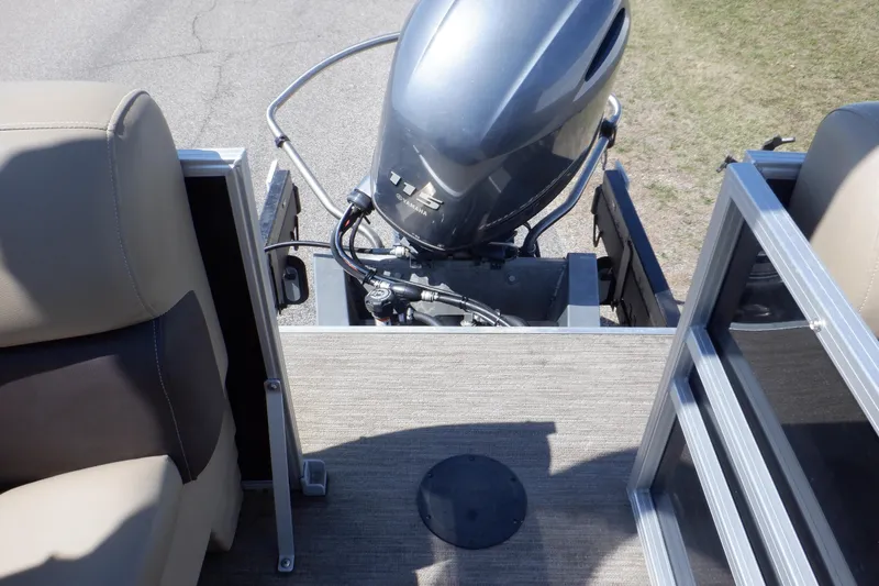 Slide: The Image of 2021 Sylvan Mirage 820 LZ boat with outboard motor and seating area. - 31